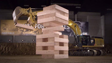 Watch these Caterpillar excavators play the biggest game of Jenga ever