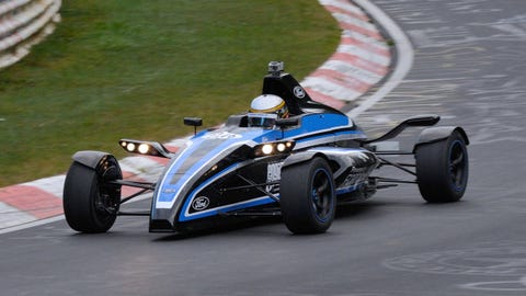 Tire, Automotive tire, Automotive design, Open-wheel car, Formula one tyres, Land vehicle, Automotive wheel system, Motorsport, Car, Automotive exterior, 