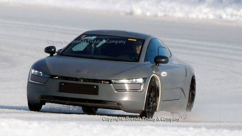 14 Volkswagen Xl1 Caught Testing First Vw Xl1 Production Mule Photos