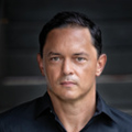 Headshot of Mark Greaney