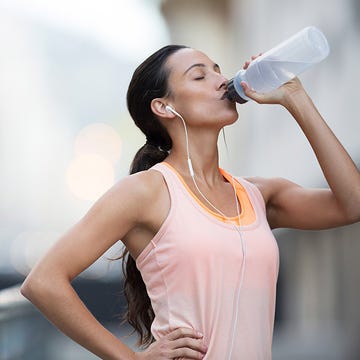 Arm, Shoulder, Sleeveless shirt, Joint, Plastic bottle, Elbow, Bottle, Liquid, Chest, Jewellery, 