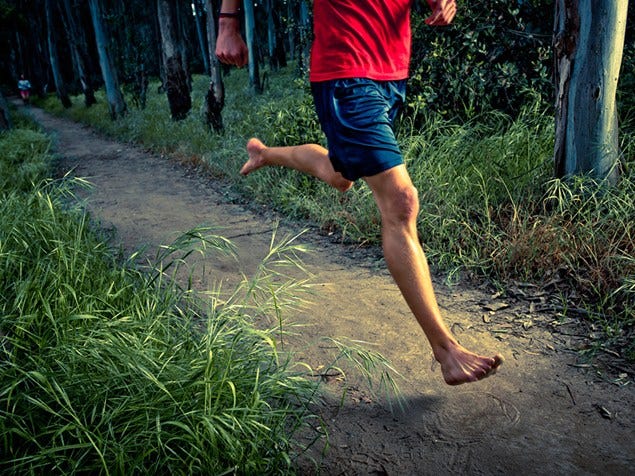 Grass, Human leg, People in nature, Toe, Barefoot, Foot, Calf, Grass family, Active shorts, Bermuda shorts, 