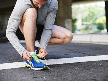 Human leg, Elbow, Joint, Knee, Asphalt, Wrist, Street fashion, Muscle, Athletic shoe, Slipper, 