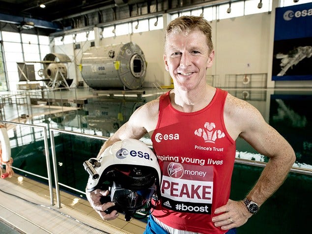 Sleeveless shirt, Glove, Uniform, Aerospace engineering, Chest, Muscle, Active tank, Vest, Trunk, Athlete, 