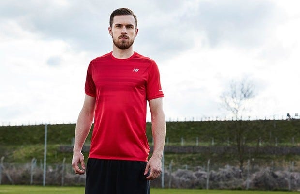 Sleeve, Standing, Sportswear, Beard, Jersey, People in nature, Facial hair, Active shorts, Sports jersey, Moustache, 