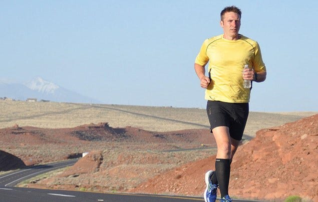 Leg, Sleeve, Human body, Human leg, Landscape, Asphalt, T-shirt, Shorts, Active shorts, Running, 