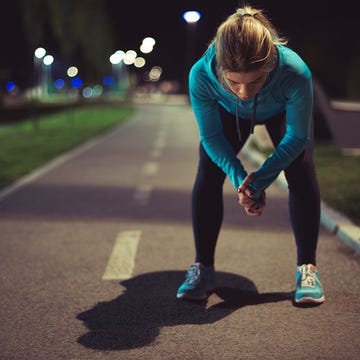 Human leg, Asphalt, Road surface, Knee, Athletic shoe, Sneakers, Thigh, Calf, Teal, Tar, 