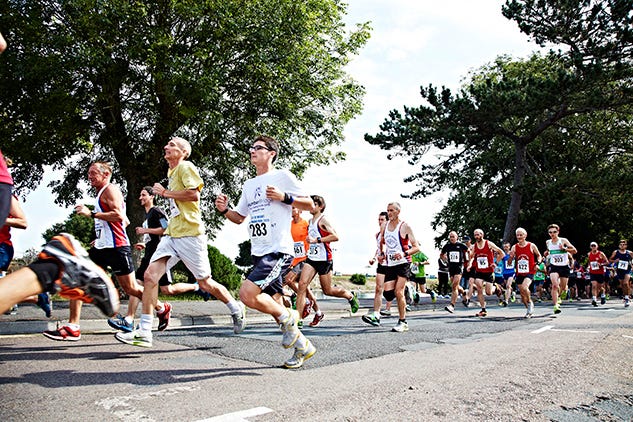 Clothing, Footwear, People, Recreation, Road, Endurance sports, Crowd, Athletic shoe, Running, Outdoor recreation, 