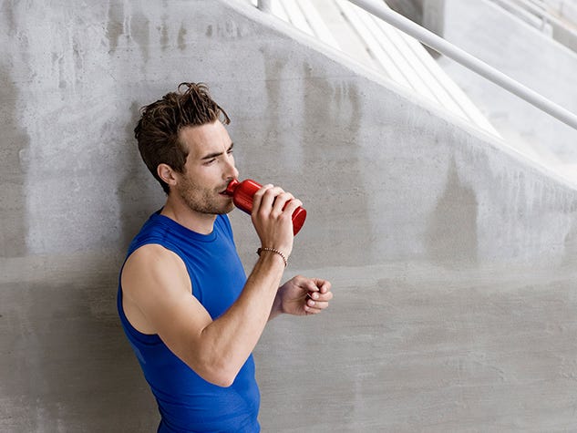 Elbow, Hand, Sleeveless shirt, Drinking, Chest, Trunk, Active tank, Undershirt, Abdomen, Physical fitness, 