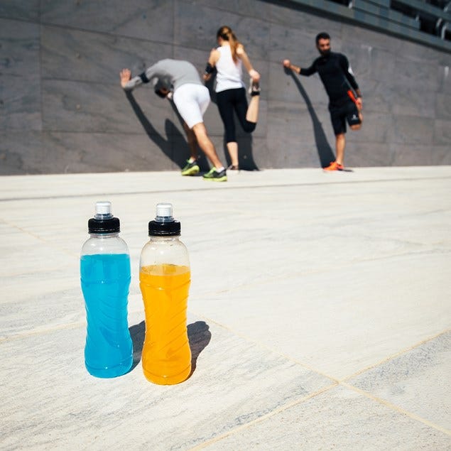 Liquid, Fluid, Drinkware, Bottle, Drink, Plastic bottle, Bottle cap, Street fashion, Pedestrian, Plastic, 