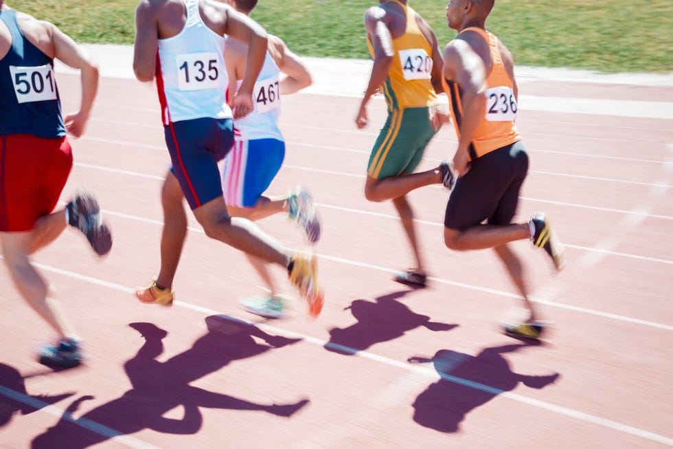 Sports uniform, Leg, Sportswear, Trousers, Human leg, Track and field athletics, Sleeveless shirt, Shoe, Athletic shoe, Jersey, 
