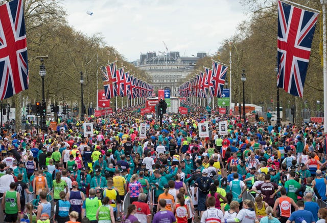 Crowd, Human, People, Event, Flag, Public event, Endurance sports, Pole, Fan, Holiday, 