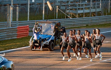 Vehicle, Team, Car, Stadium, Crowd, Cheering, Recreation, Sports, Competition event, Cheerleading, 