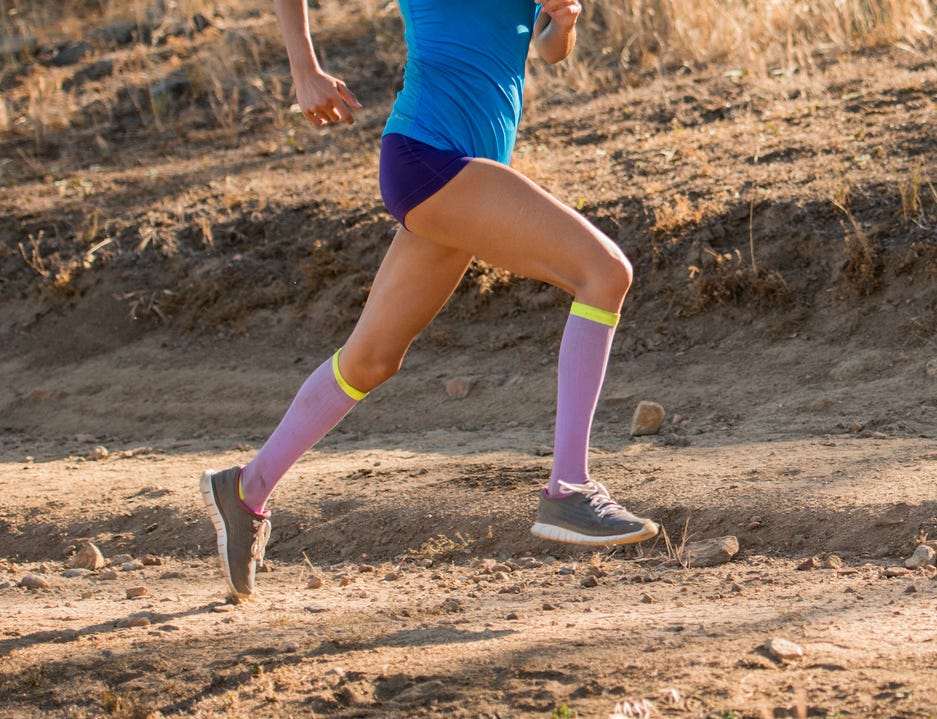Sports uniform, Human leg, Shoe, Sportswear, Joint, Sock, Soil, T-shirt, Pink, Shorts, 