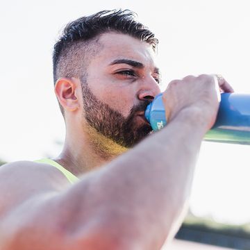 Facial hair, Water, Nose, Arm, Chin, Drinking, Beard, Muscle, Barechested, Mouth, 