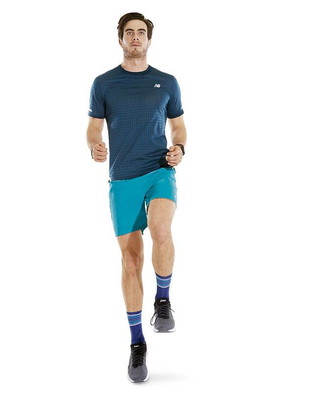 Clothing, Turquoise, Blue, T-shirt, Shorts, Sportswear, Standing, Electric blue, Knee, Sleeve, 