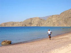 Body of water, Nature, Coastal and oceanic landforms, Natural environment, Shore, Coast, Mountainous landforms, Sand, Hill, Landscape, 