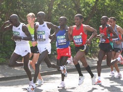 Clothing, Footwear, People, Recreation, Social group, Endurance sports, Photograph, Quadrathlon, Sleeveless shirt, Running, 
