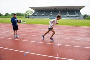 Sport venue, Track and field athletics, Standing, Athletic shoe, Line, Shorts, Running, Sports, Race track, Knee, 