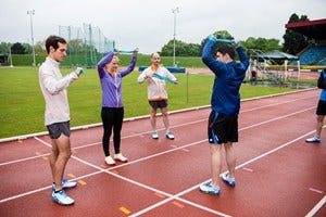 Footwear, People, Sport venue, Fun, Sports uniform, Standing, Photograph, Athletic shoe, Community, Leisure, 