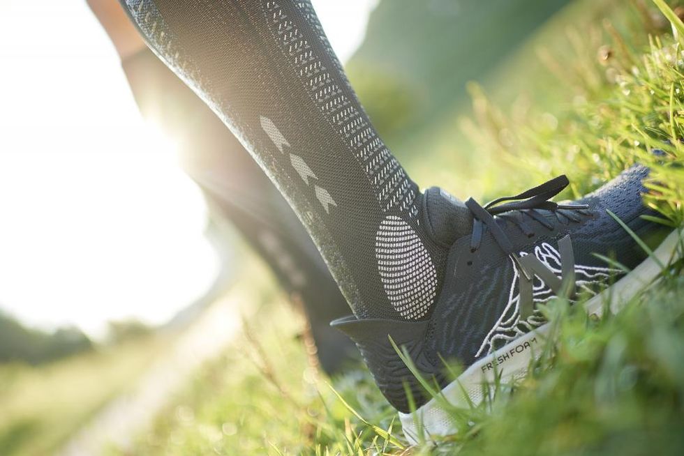 Le calze compressive Floky Run Up progettate per migliorare la biomeccanica del runner.