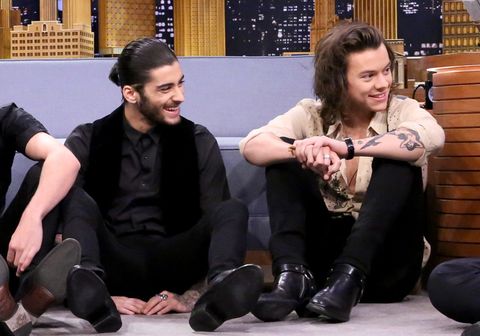 Arm, Couch, Leather, Laugh, Dress shoe, Boot, Shelf, 