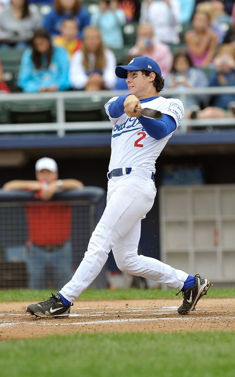 Nick Jonas swings baseball bat