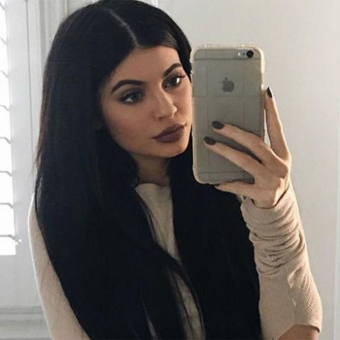 Finger, Hairstyle, Eyebrow, Mobile phone, Selfie, Fixture, Long hair, Beauty, Black hair, Portable communications device, 