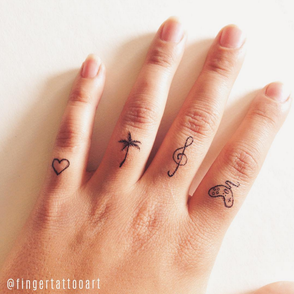 finger tattoos | girly stuff on fingers | jacob brewer | Flickr