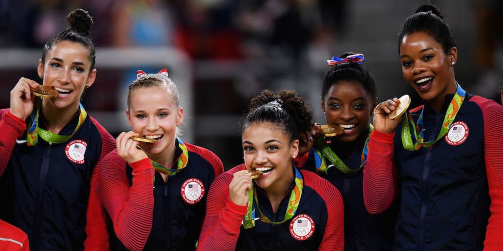 The Weird Science Behind Why Olympians Always Bite Their Gold Medals 