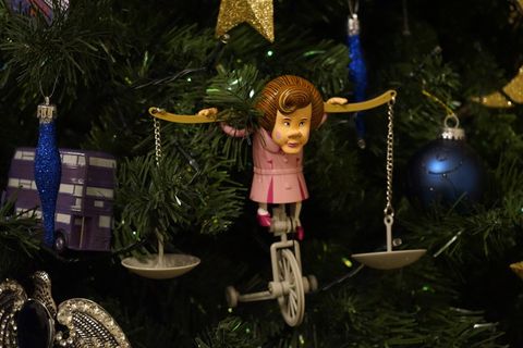 Christmas decoration, Holiday, Toy, Bicycle wheel, Fictional character, Christmas ornament, Christmas, Bicycle, Ornament, Conifer, 