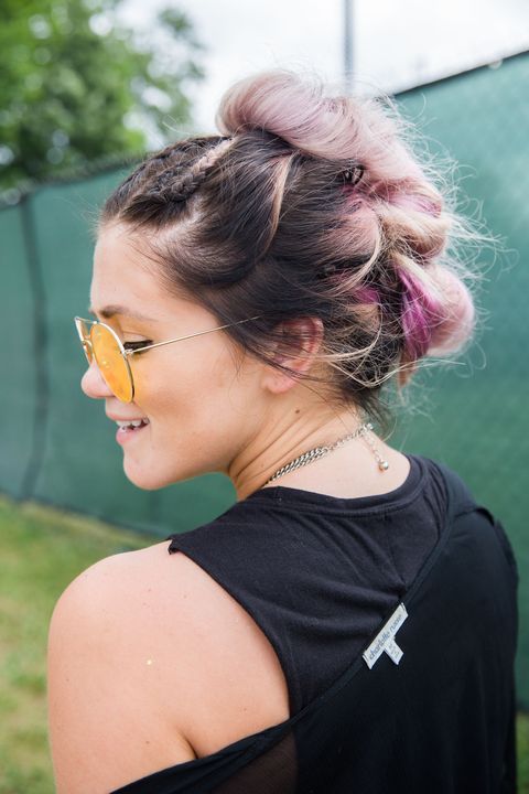<p>Spotted at the braid tent (yes, there was one): Kelsey's&nbsp;bun mohawk<span class="redactor-invisible-space" data-verified="redactor" data-redactor-tag="span" data-redactor-class="redactor-invisible-space"></span>, styled from a pink dye job that magically faded to purple.&nbsp;</p>