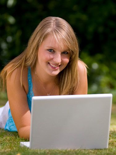 happy girl on laptop