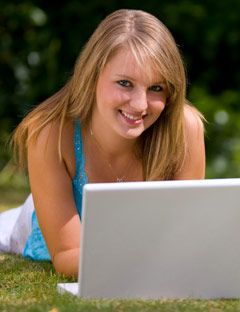 girl-on-lawn-with-laptop