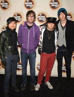 four men on red carpet at MTV Woodie Awards