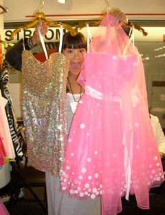 Textile, Pink, Dress, Magenta, One-piece garment, Fashion, Costume, Embellishment, Light fixture, Day dress, 