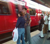 Mode of transport, Transport, People, Vehicle, Human body, Public transport, Passenger, Red, Rolling stock, Standing, 