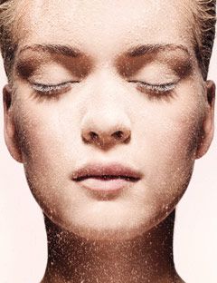 models face with dusting of powder
