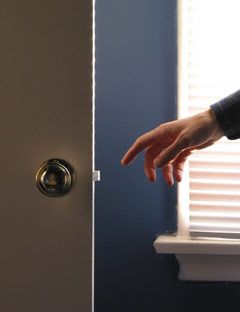 hand reaching for doorknob