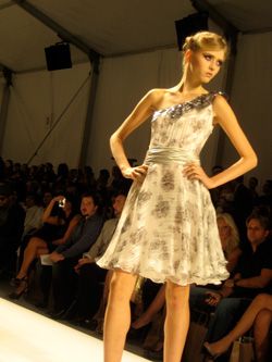 Clothing, Leg, Fashion show, Hairstyle, Event, Dress, Human body, Shoulder, Joint, Runway, 