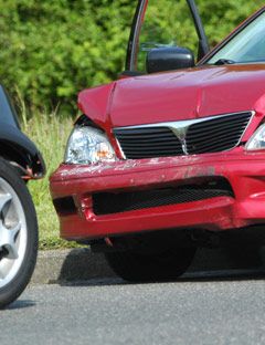 red car front end crash damage