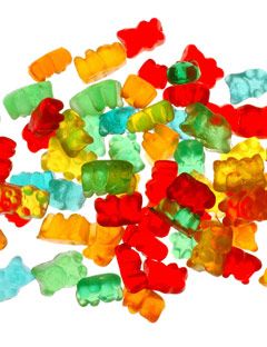 colorful gummy bear candies on a white background