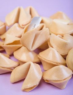 fortune cookies on a pink surface