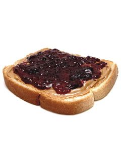 slice of bread with pb and jelly