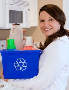 girl with recycling bin