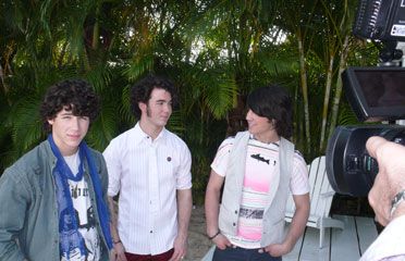 a glimpse behind the scenes at the jonas brothers teen cover shoot