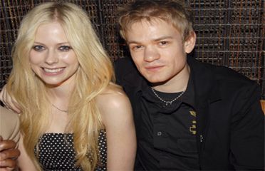 Avril Lavigne and Deryck Whibley dine with L.A. Reid at his Beverly Hills b'day bash
