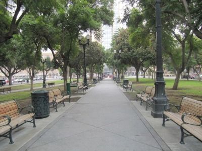 Bench, Property, Public space, Road surface, Neighbourhood, Tree, Town, Outdoor furniture, Furniture, Outdoor bench, 