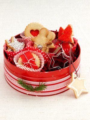Red, Basket, Costume accessory, Present, Home accessories, Christmas, Ribbon, Wicker, Toy, Picnic basket, 