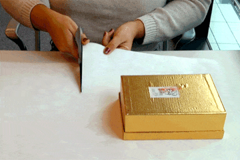Wrist, Box, Tan, Shipping box, Rectangle, Packaging and labeling, Thumb, Nail, Cardboard, Packing materials, 